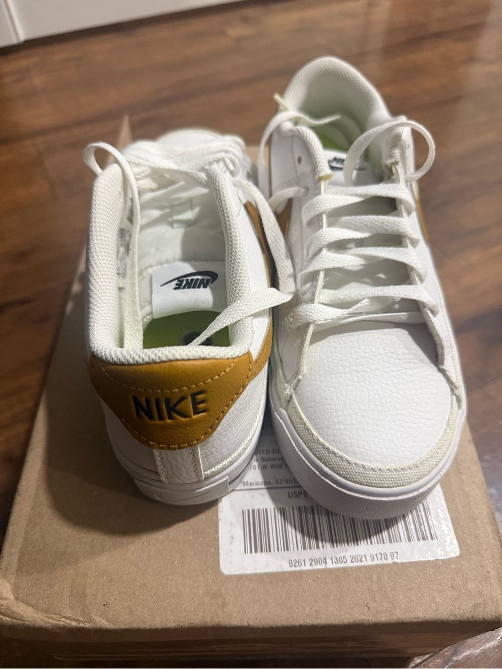 Nike Women White Sneakers with Mustard Heel Accent